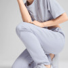 Штани жіночі Puma EVOSTRIPE Sweatpants блакитні 68505147