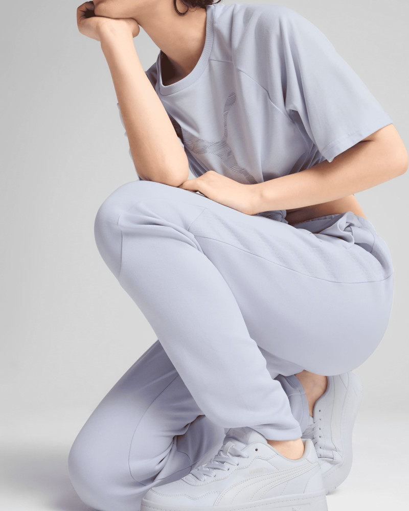 Штани жіночі Puma EVOSTRIPE Sweatpants блакитні 68505147