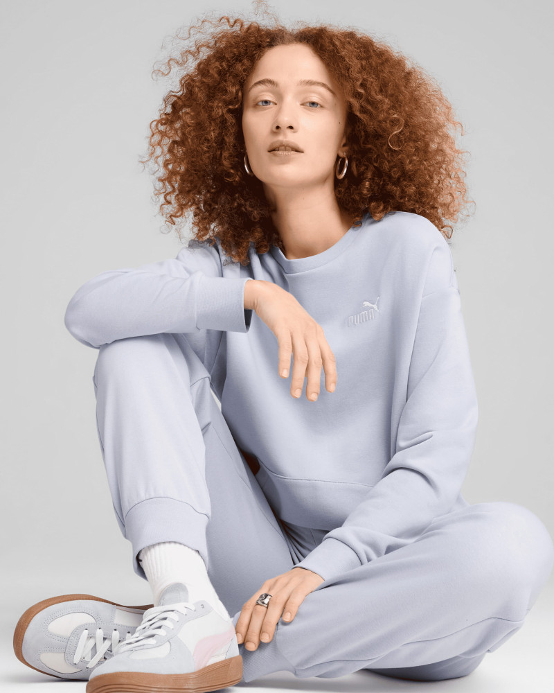 Women's tracksuit Puma Relaxed Sweat Suit TR cl light blue 68507447