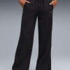 Pantalones para mujer Puma HER Comfort High-Waist Wide Leg Pants TR negros 69188901